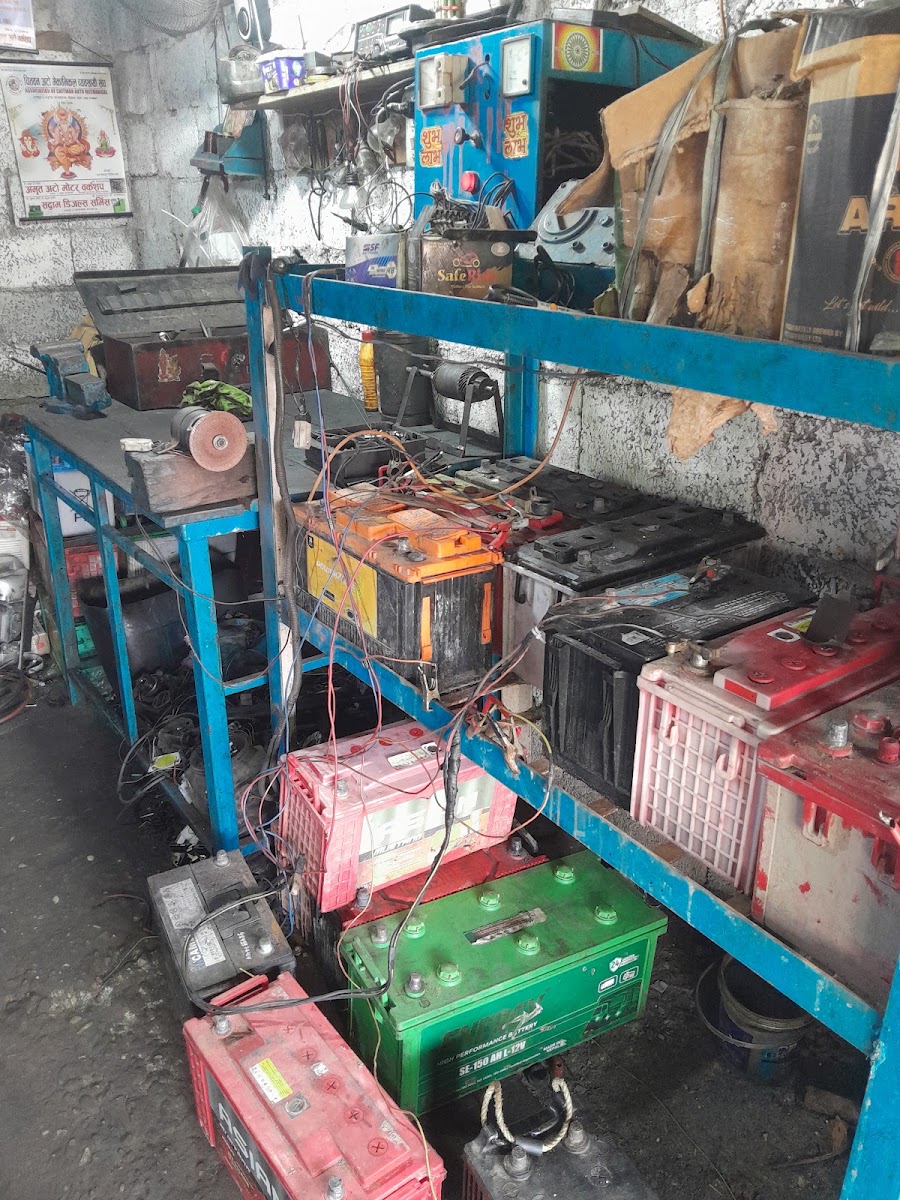 Shelves of tested and reconditioned batteries and wiring stock at Kalika's Bharatpur workshop